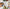 Flat lay of Holiday Magic cross stitch kit materials.