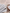 18 count Vintage Gray Aida Cloth by Zweigart 3793/7729, precut cross stitch fabric draped beside a wooden embroidery hoop