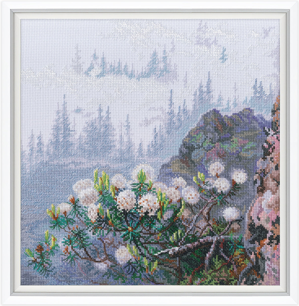 Cross-stitched landscape with trees and flowers in a silver frame