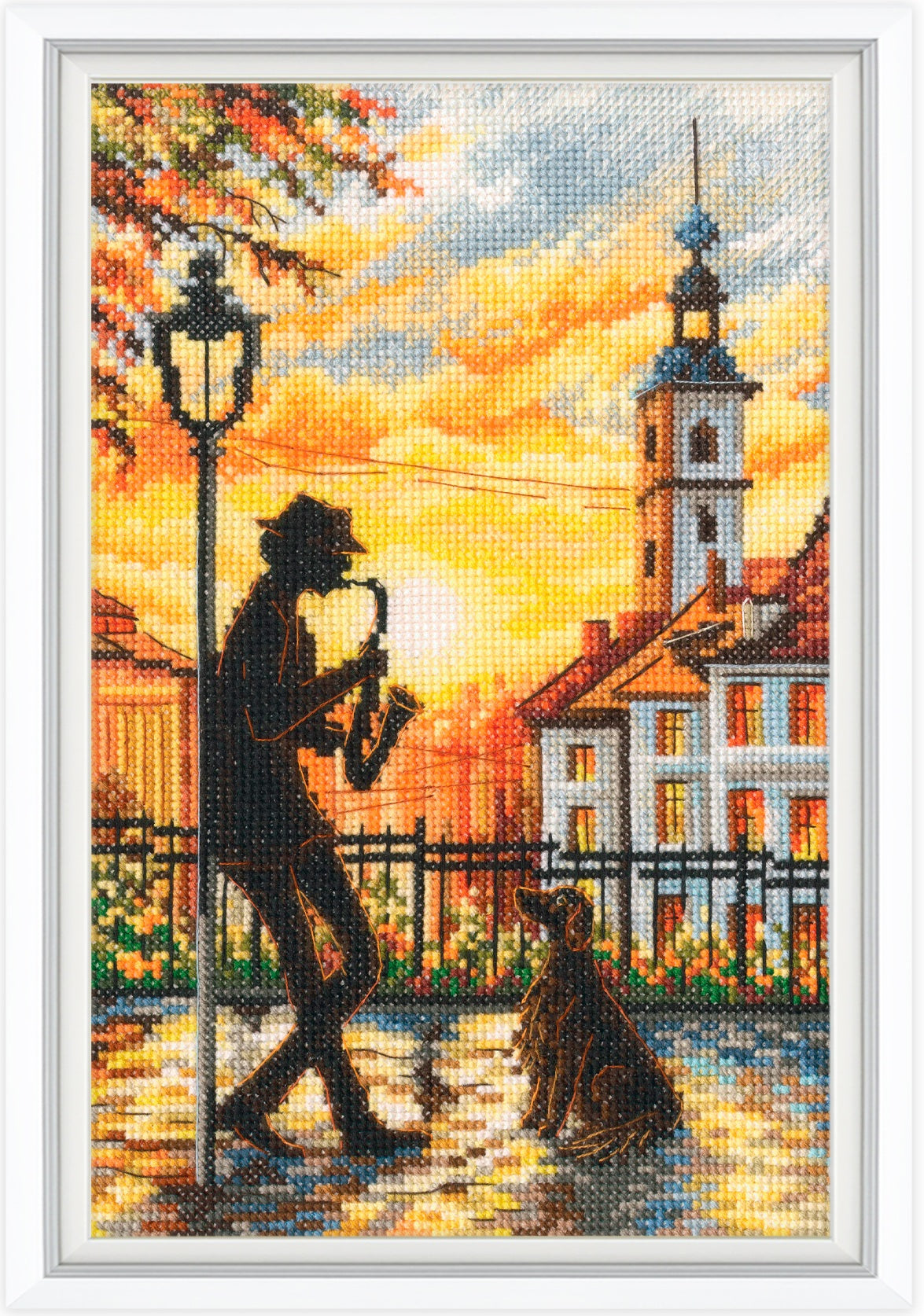 Cross-stitched artwork of a saxophonist and cat on a street at sunset.