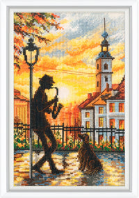 Cross-stitched artwork of a saxophonist and cat on a street at sunset.