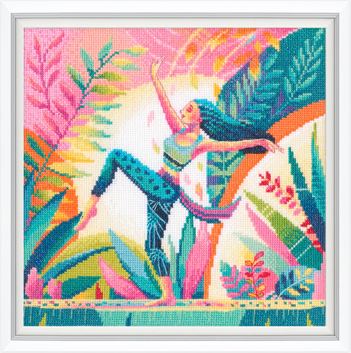 Colorful cross-stitch pattern of a woman in a tropical setting with vibrant foliage.